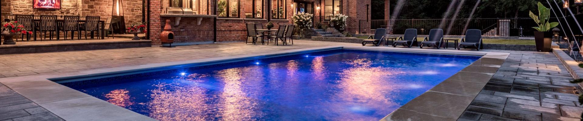 Pool with stone edging and patio