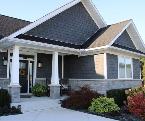 Front of House with Stone & Landscaping